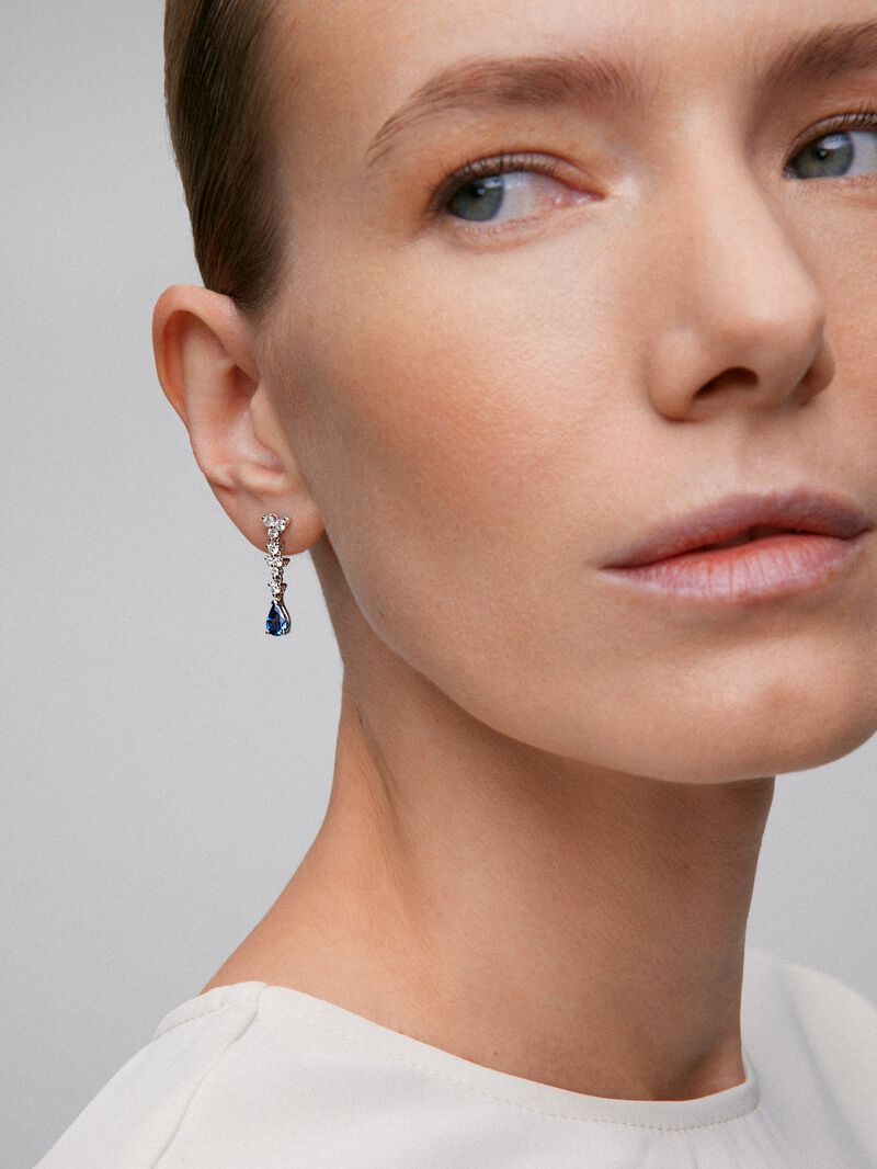 18K white gold earrings with 2 pear-cut blue sapphires with a total of 1.68 cts and 16 brilliant-cut diamonds with a total of 0.76 cts image number 1