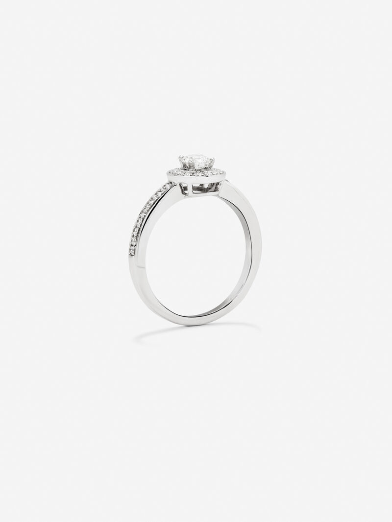 18K white gold solitaire engagement ring with a halo of diamonds image number 4