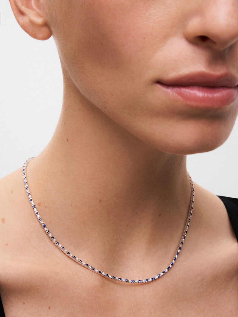 18K white gold riviere choker necklace with diamond and sapphire. image number 1