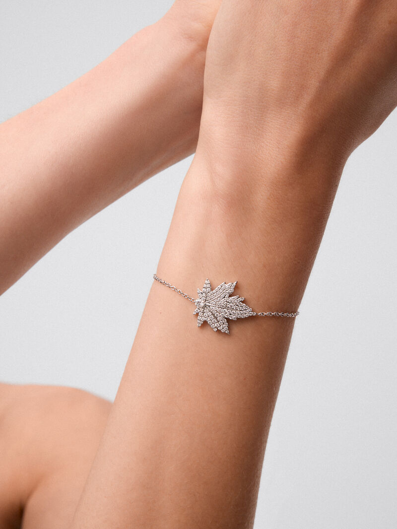18K white gold bracelet with a 0.14 ct central brilliant-cut diamond, diamond pavé, and a maple leaf design image number 3