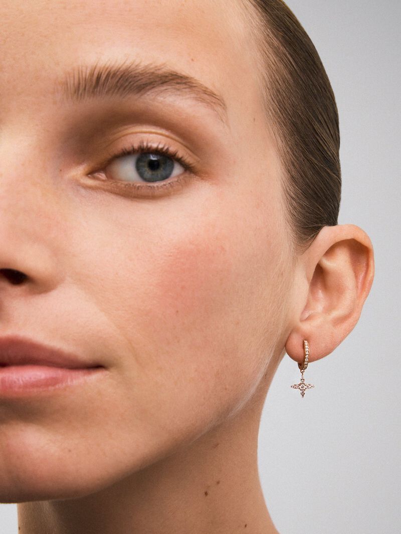 Individual hoop earring with hanging star in 18K rose gold with diamonds. image number 3