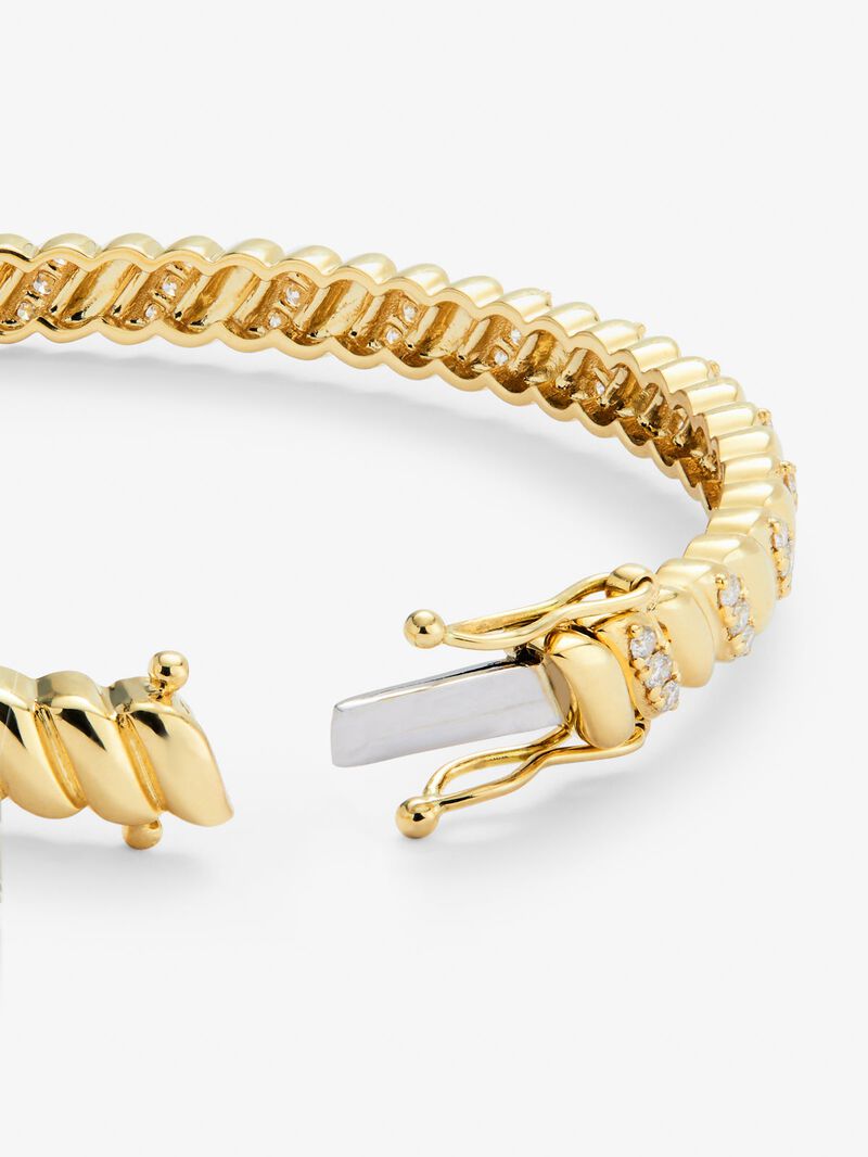Rigid yellow gold bracelet of 18k with white diamonds in 0.58 cts image number 4