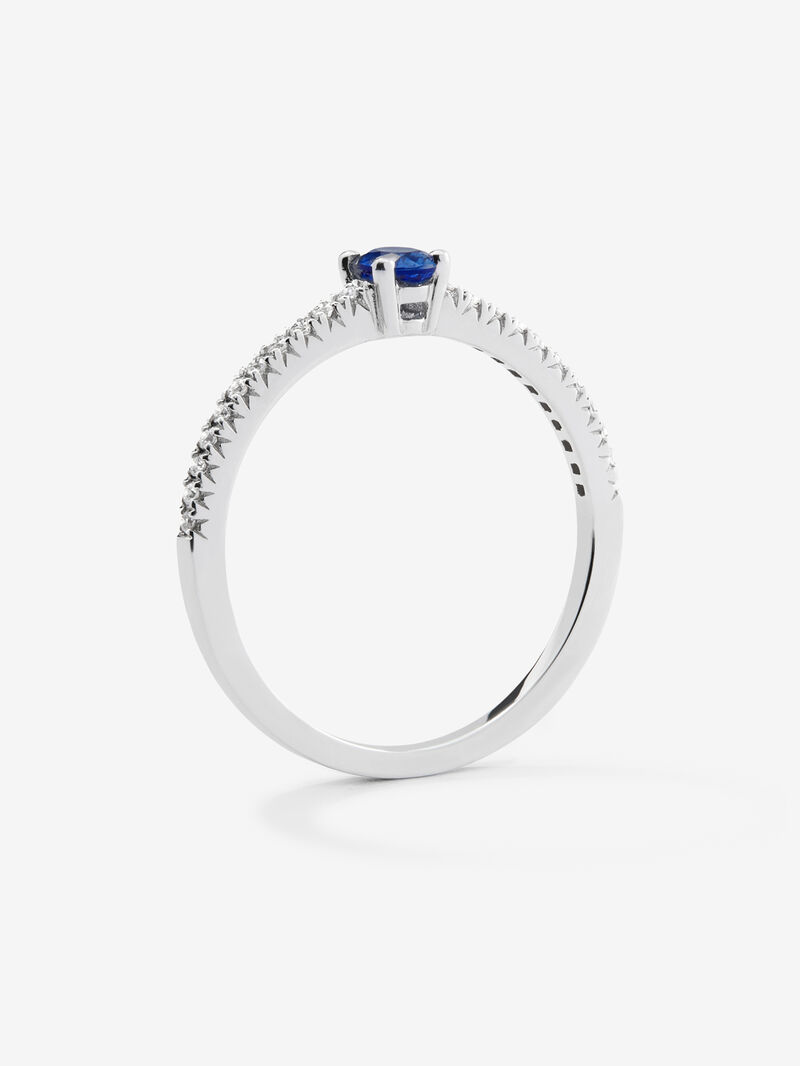 18K white gold ring with oval-cut blue sapphire of 0.2 cts and arm of 22 brilliant-cut diamonds with a total of 0.09 cts image number 4