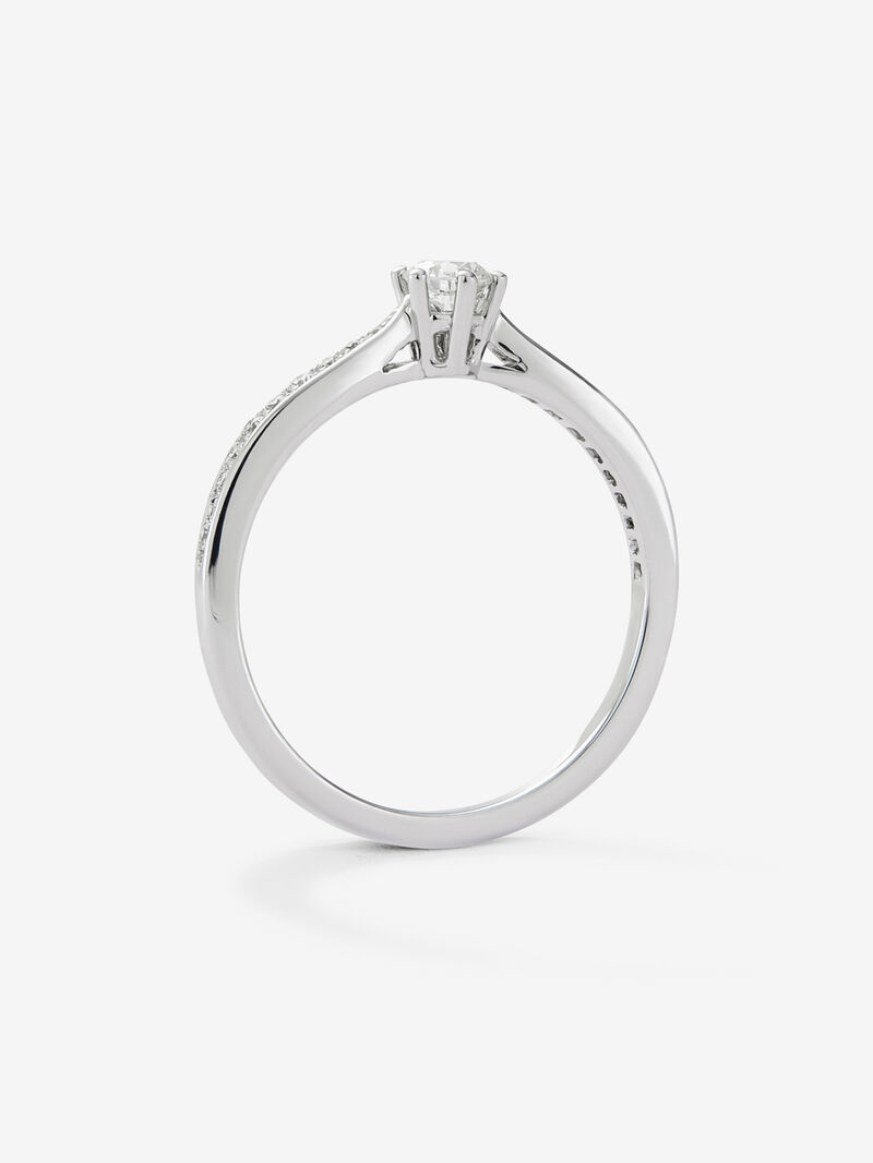 Solitaire ring in 18K white gold with a central 0.20-carat brilliant-cut diamond and additional diamonds totaling 0.10 cts image number 4