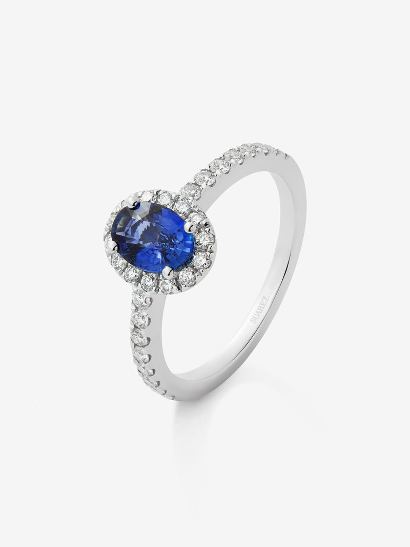 18K white gold ring with a 0.91 ct oval-cut blue sapphire and a brilliant-cut diamond border with a total of 0.37 cts image number 0