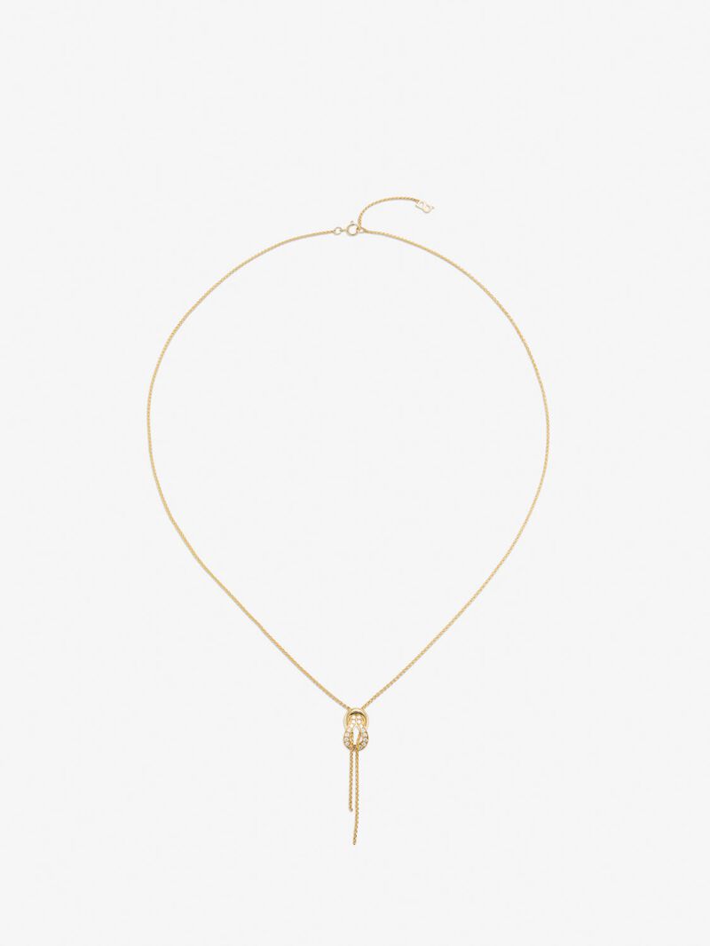 18K yellow gold pendant with 26 brilliant-cut diamonds with a total of 0.16 cts and a knot shape image number 0