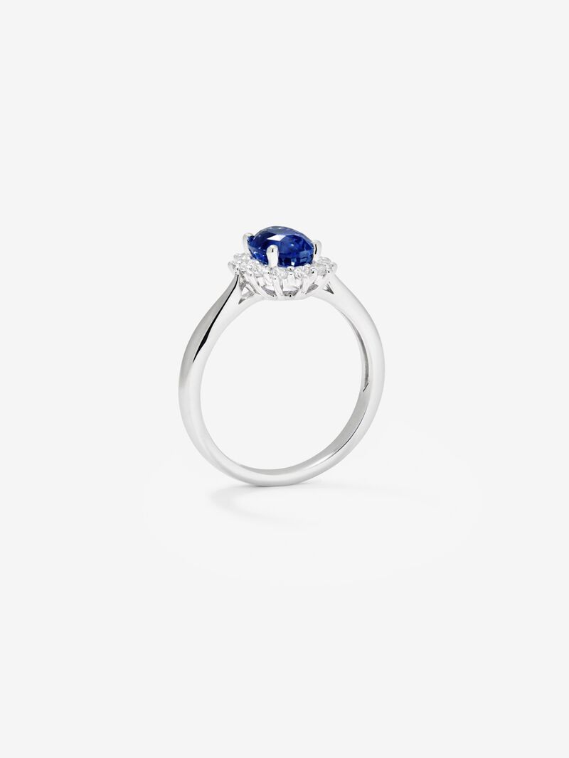 18K white gold ring with a 1.34 ct oval-cut blue sapphire and brilliant-cut diamonds totaling 0.29 cts image number 2