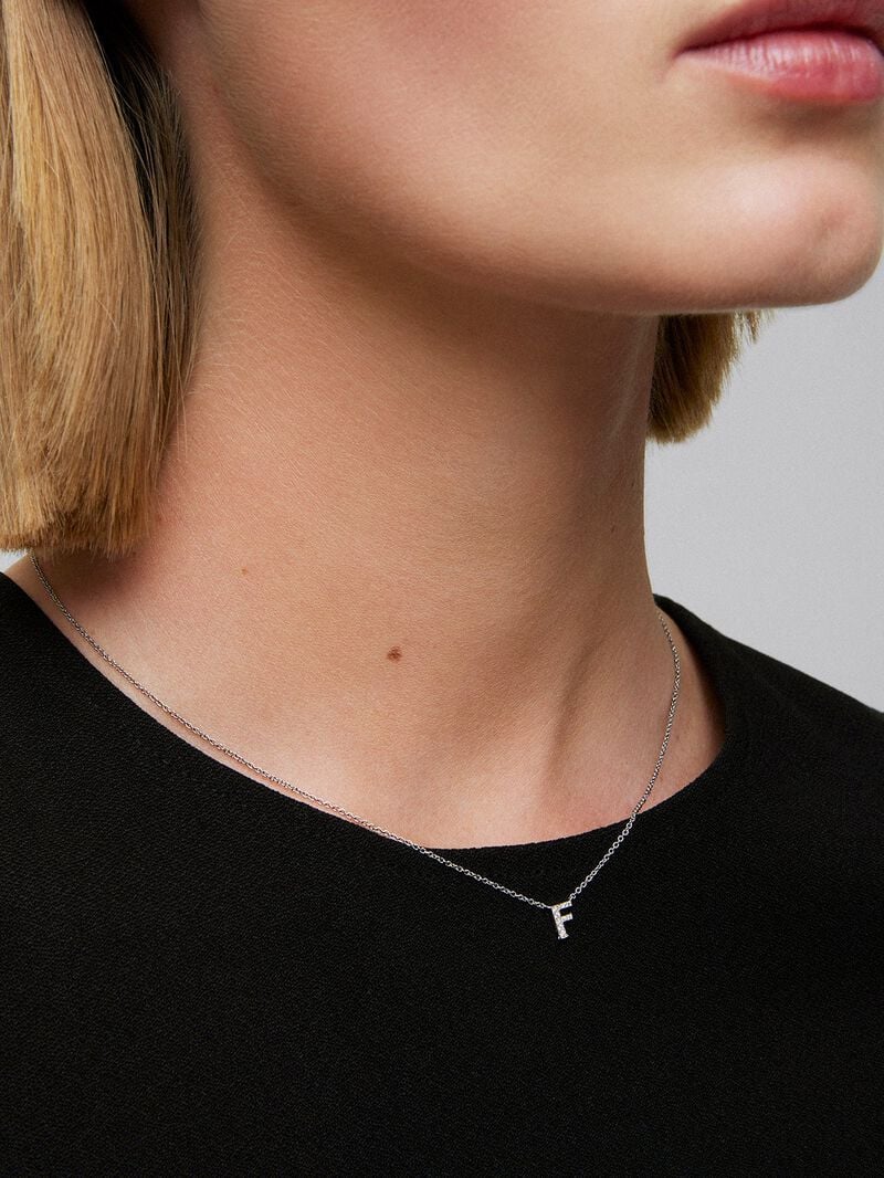 Pendant necklace with small initial in 18K white gold and diamonds. image number 3
