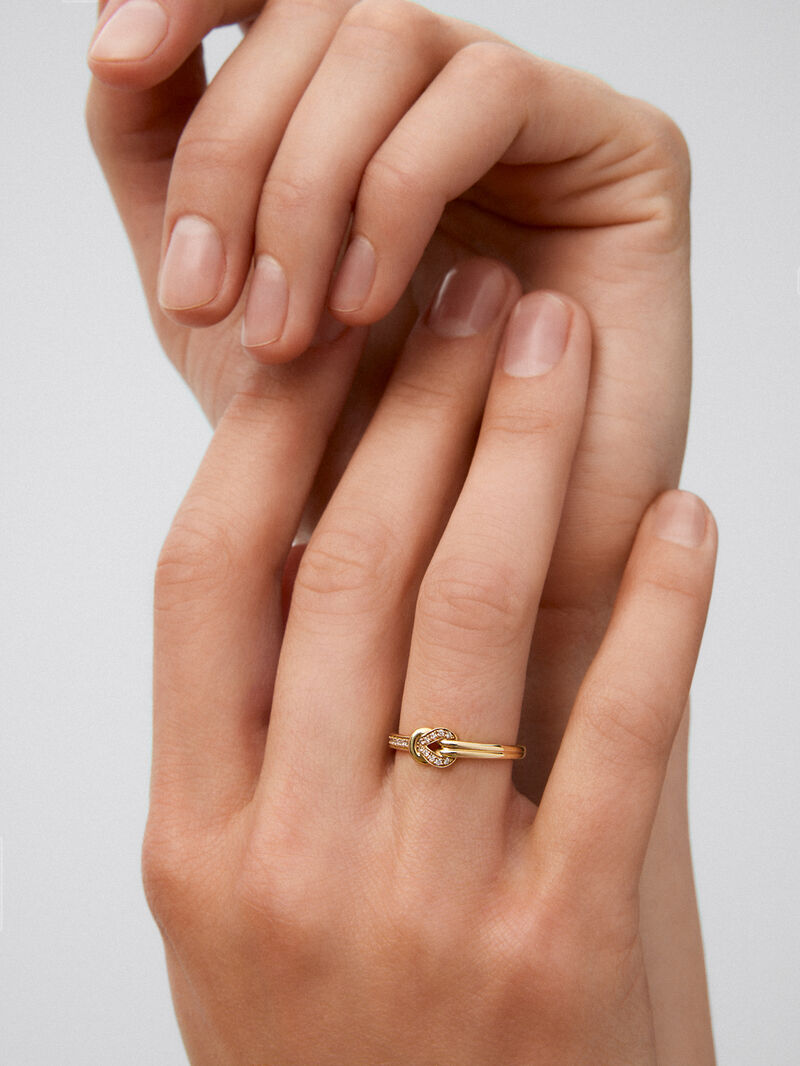18K yellow gold ring with 15 brilliant-cut diamonds with a total of 0.09 cts and a knot shape image number 3