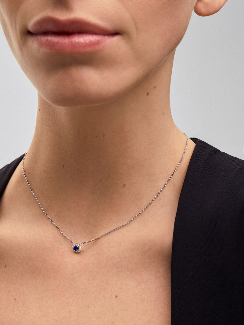 18K white gold pendant with a brilliant-cut blue sapphire of 0.37 cts and 10 brilliant-cut diamonds with a total of 0.14 cts in the shape of a star image number 1
