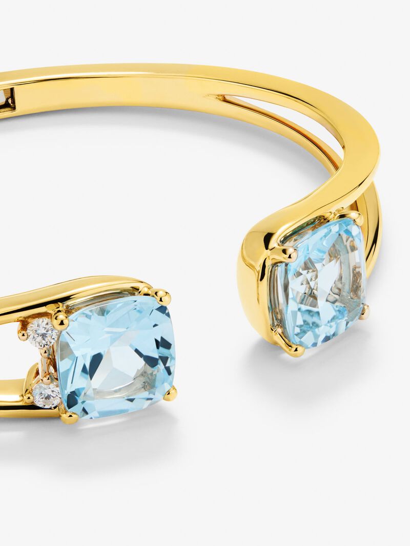 Rigid 18K yellow gold bracelet with 2 sky blue topazes in cushion cut with a total of 0.12 cts image number 2