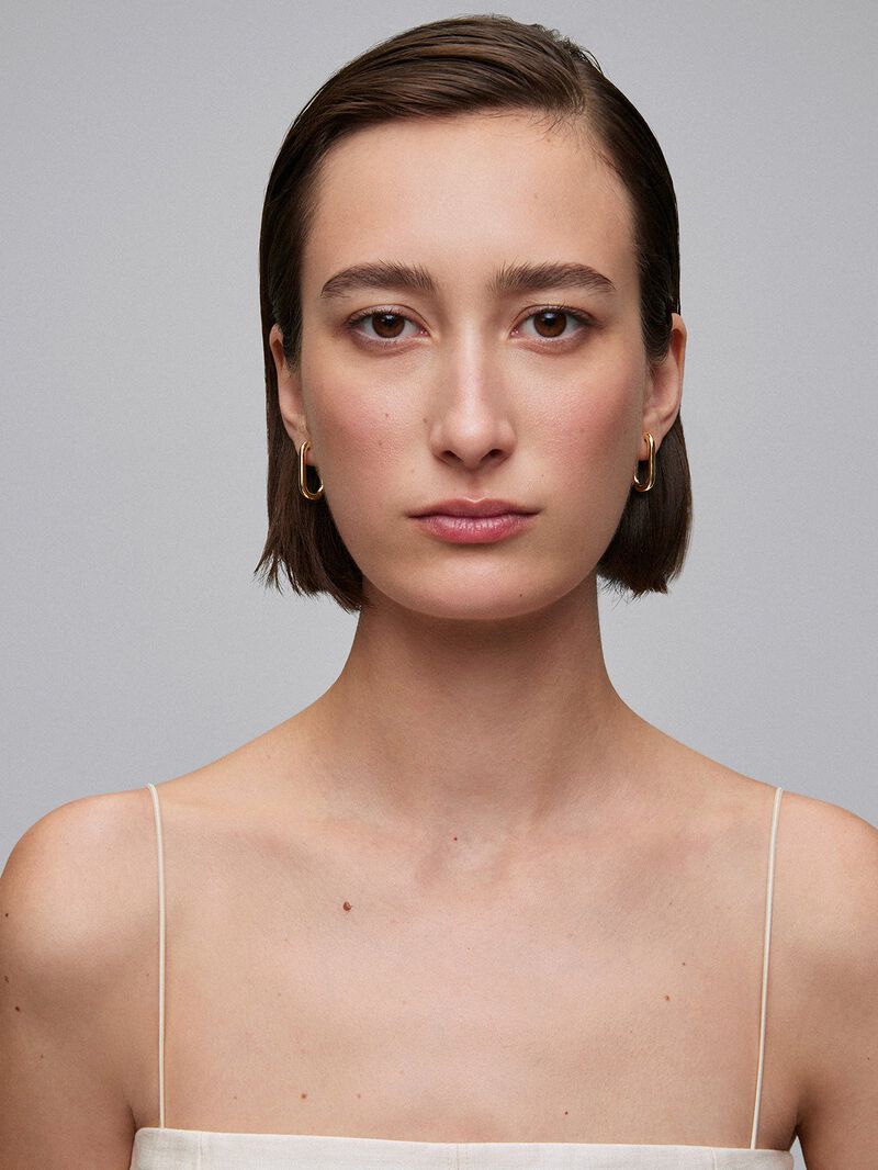 Short forza chain earrings in 18k yellow gold. image number 1