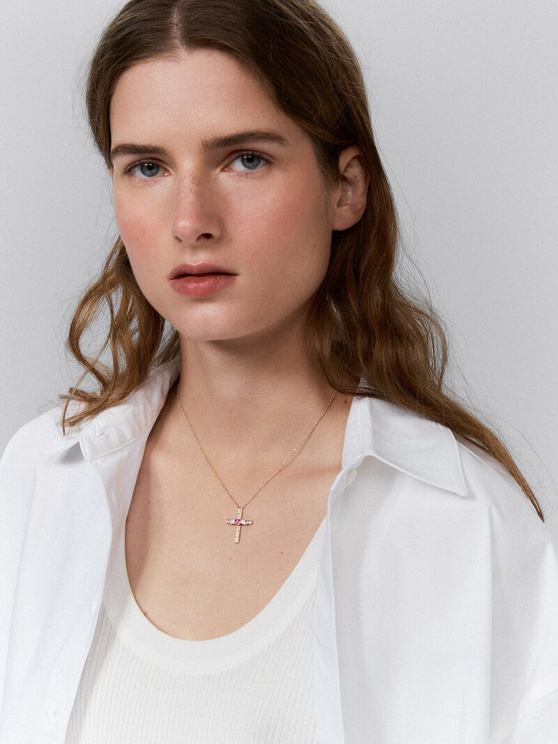 Cross and heart pendant with wings made of 18kt rose gold, adorned with diamonds and pink sapphires. image number 0