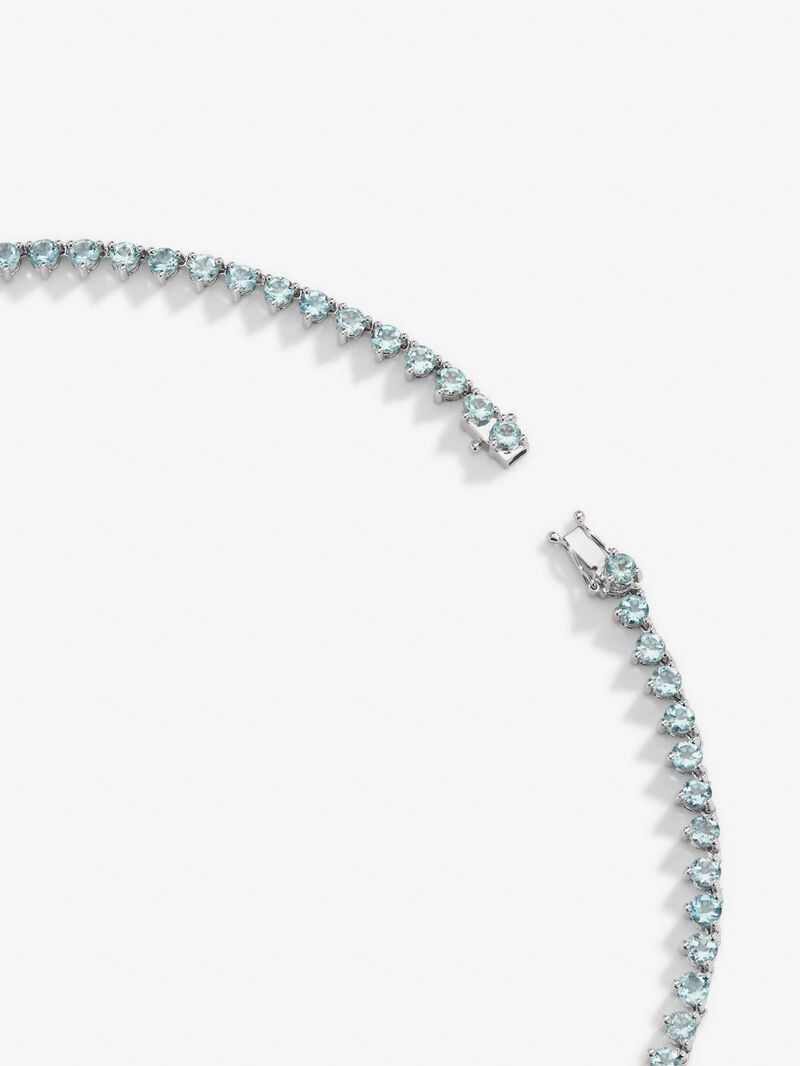 18K white gold rivière necklace with 25 pear-cut blue aquamarines with a total of 8.33 cts, 39 brilliant-cut diamonds with a total of 5.868 cts and 103 brilliant-cut diamonds with a total of 3.82 cts image number 4