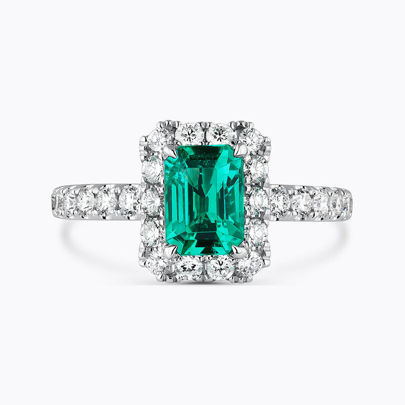 Anillo de oro blanco con diamantes y esmeralda verde de 1,18 | Joyería Suarez