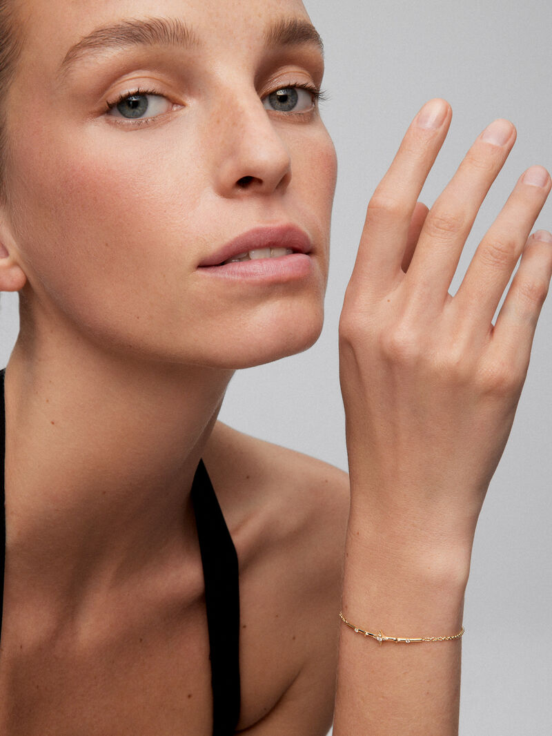 18K yellow gold bracelet with 7 brilliant-cut diamonds with a total of 0.08 cts image number 1