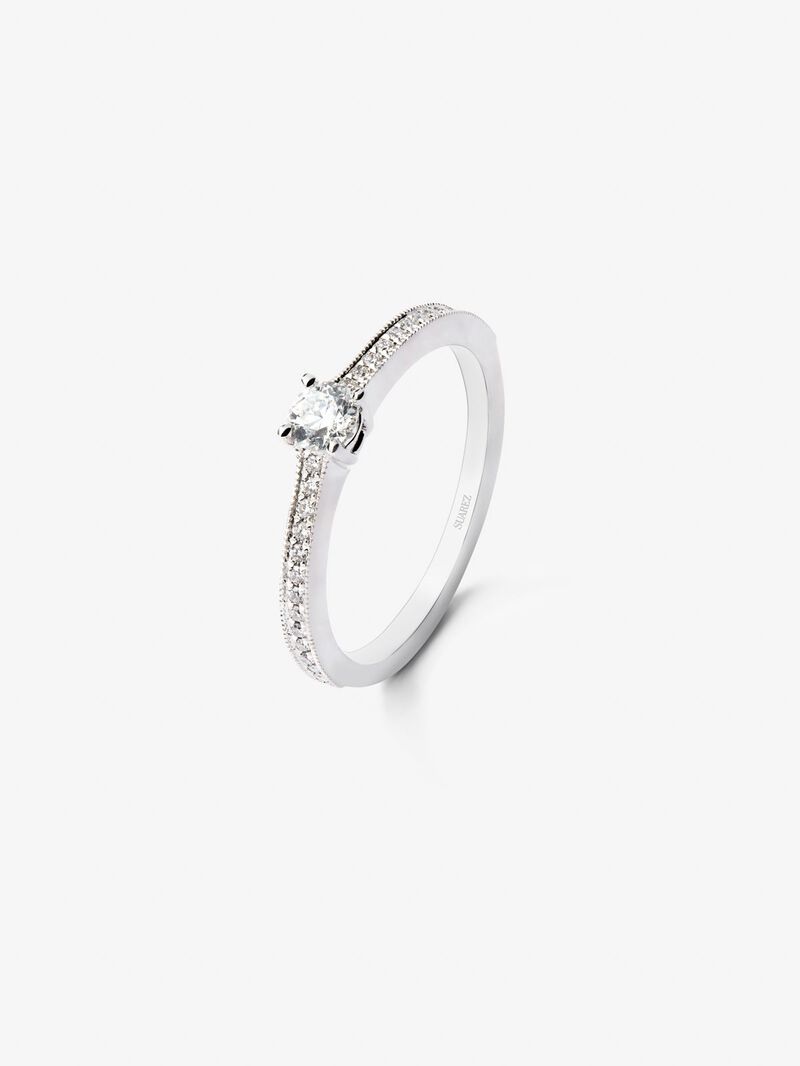 18K white gold solitaire ring with a central brilliant-cut diamond of 0.23 cts and an arm of 29 brilliant-cut diamonds with a total of 0.12 cts image number 0