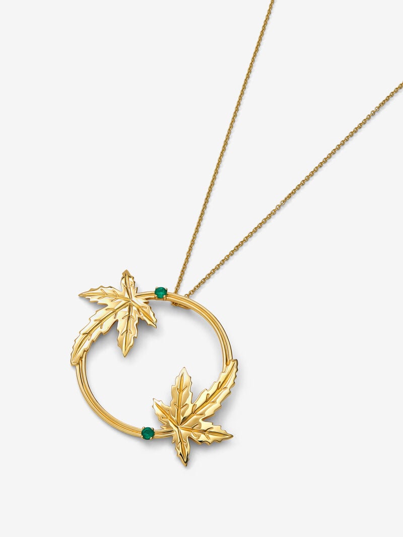 18K yellow gold pendant with two brilliant-cut emeralds totaling 0.29 cts, in a maple leaf design image number 2