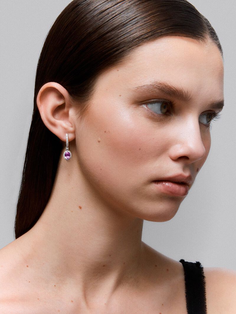 18K white gold earrings with 2 oval-cut pink sapphires with a total of 2 cts and 54 brilliant-cut diamonds with a total of 0.26 cts image number 1