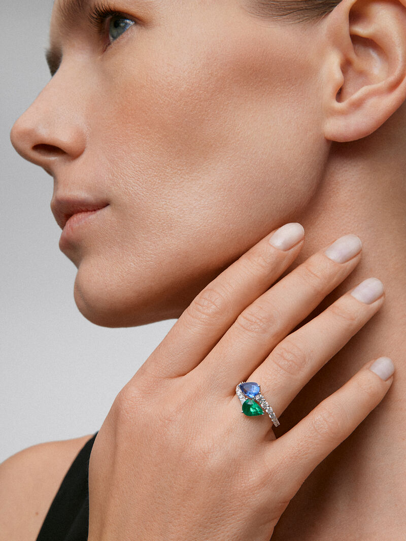 You and I 18k White Gold Ring with intense blue zafiro in 1.49 cts pear size, emerald green in 1.04 cts pear size and white diamonds in a bright size of 0.64 cts image number 1
