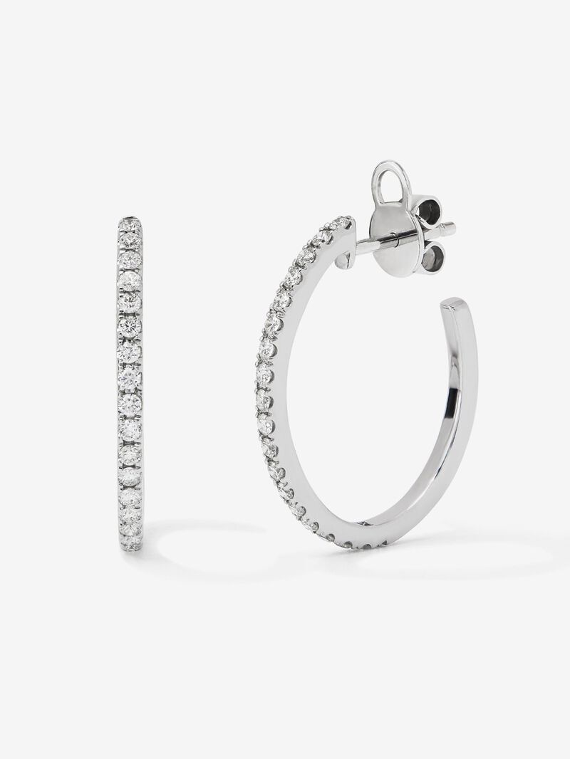 Thin hoop earrings made of 18K white gold with diamonds. image number 1