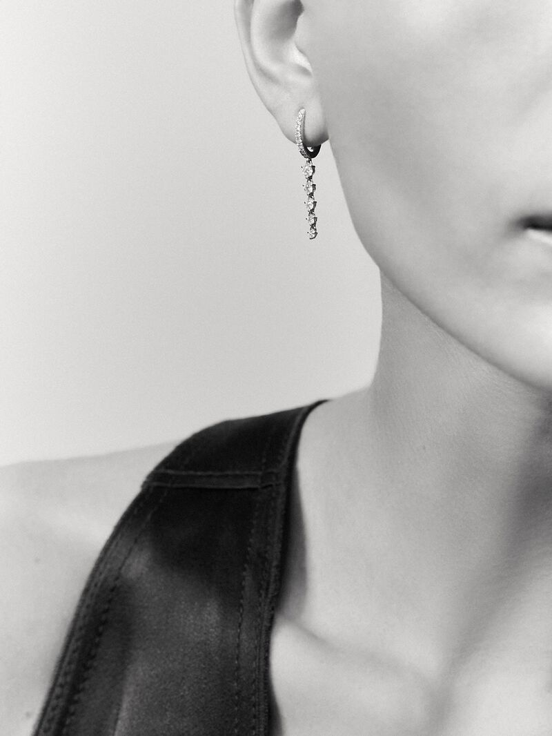 Long hoop earrings made of 18K white gold with diamonds. image number 3