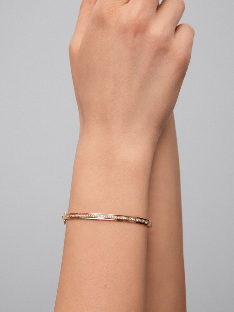 Rigid 18K yellow gold bracelet with 64 brilliant-cut diamonds with a total of 0.38 cts image number 3