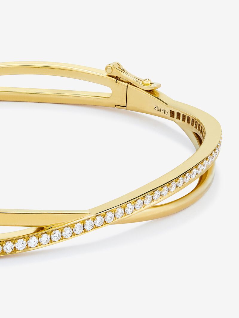 Rigid yellow gold bracelet of 18k with white diamonds in 0.74 cts image number 2