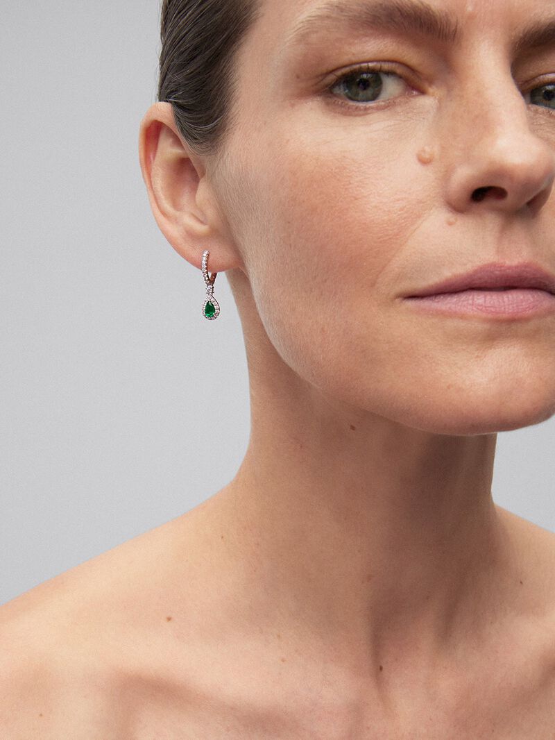 18K white gold earrings with 2 pear-cut green emeralds with a total of 0.7 cts and 48 brilliant-cut diamonds with a total of 0.53 cts image number 1