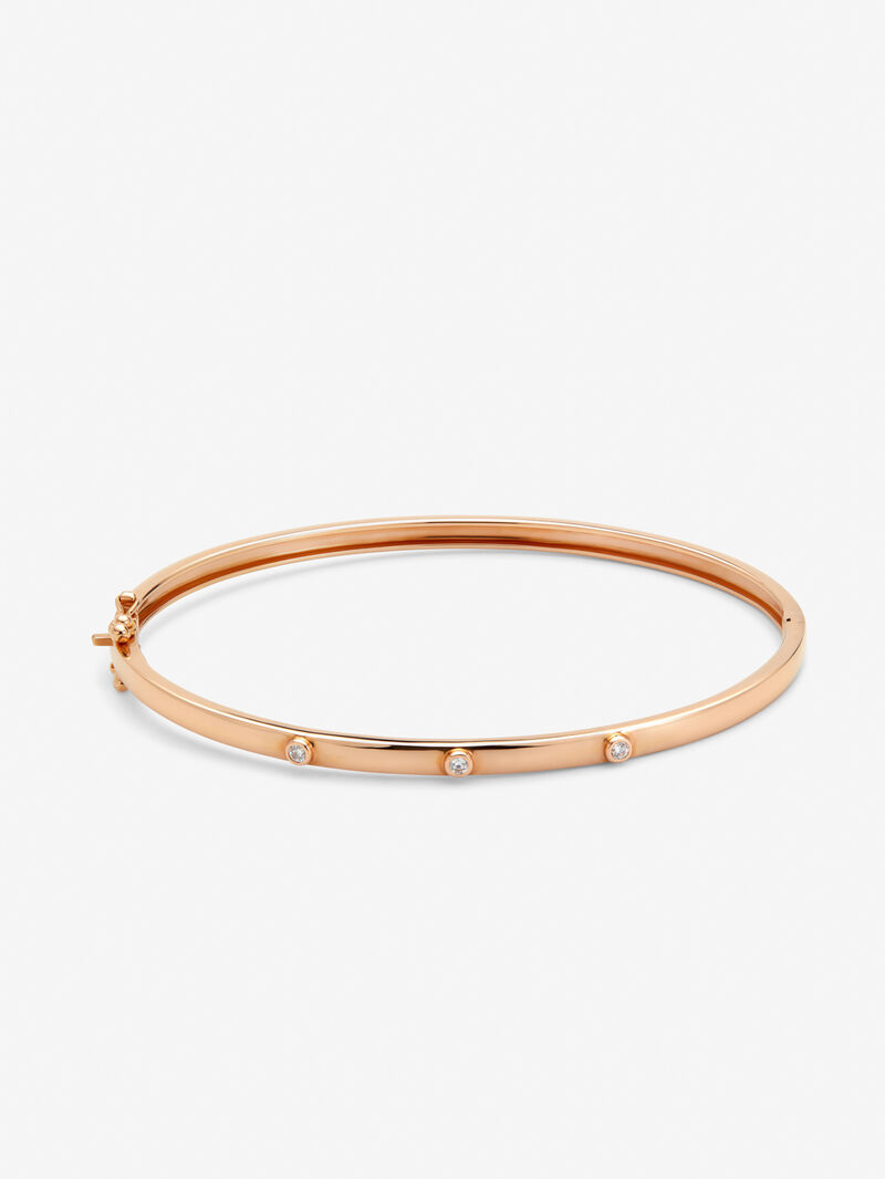 Thin rigid bracelet in 18K rose gold with diamonds. image number 0