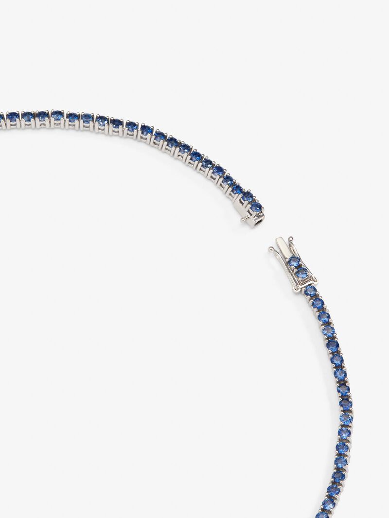 18K White Golden Collar with blue skews in 15.7 cts oval size, 10.17 cts and white diamonds in a bright size of 3.08 cts image number 2