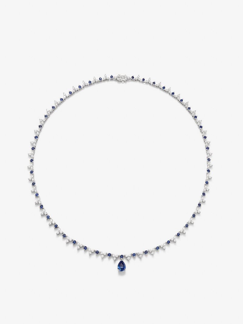 18K white gold necklace with Royal blue sapphire in 1.25 cts pear size, blue sapphires in 2.96 and white diamonds in bright size of 4.27 cts image number 1