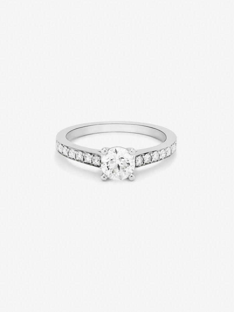 18K white gold solitaire ring with a central diamond of 0.4 cts and an arm of 14 brilliant-cut diamonds with a total of 0.29 cts image number 1