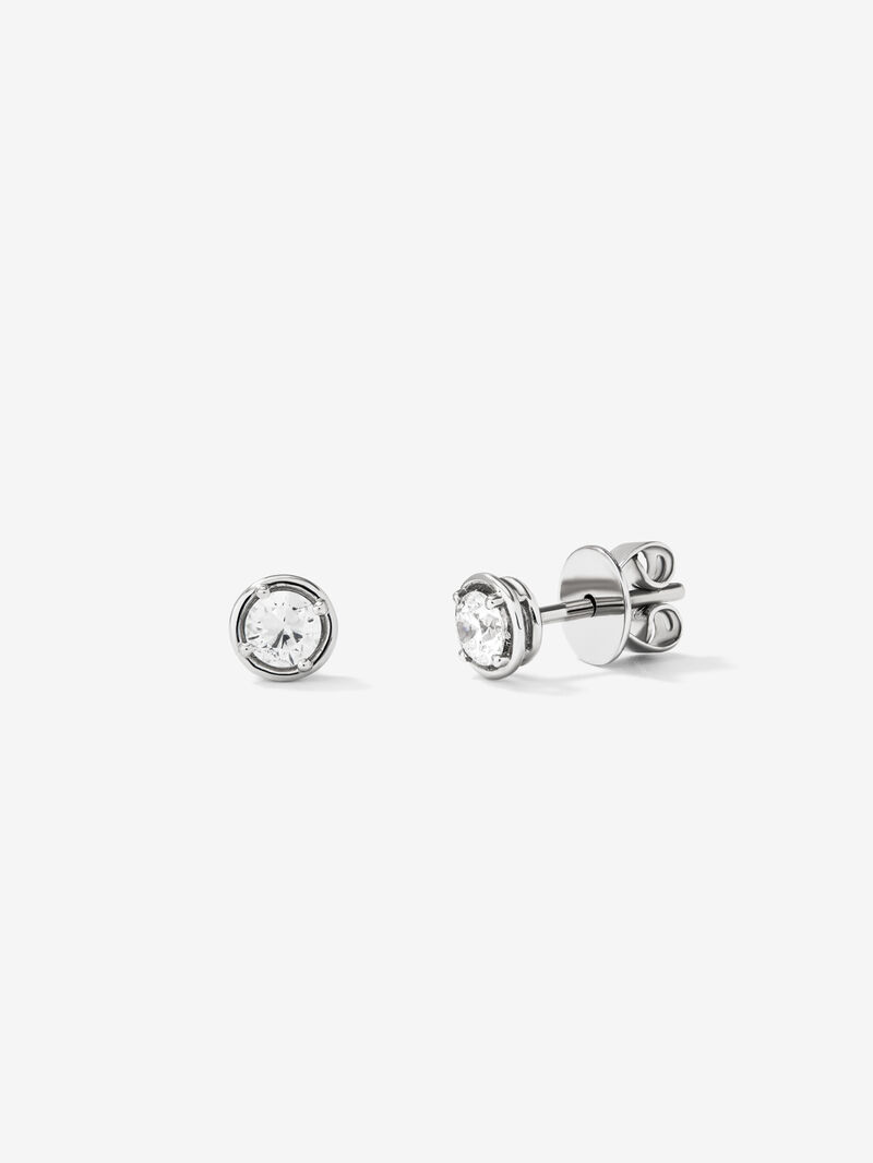 18K white gold earrings with solitary diamond. image number 0