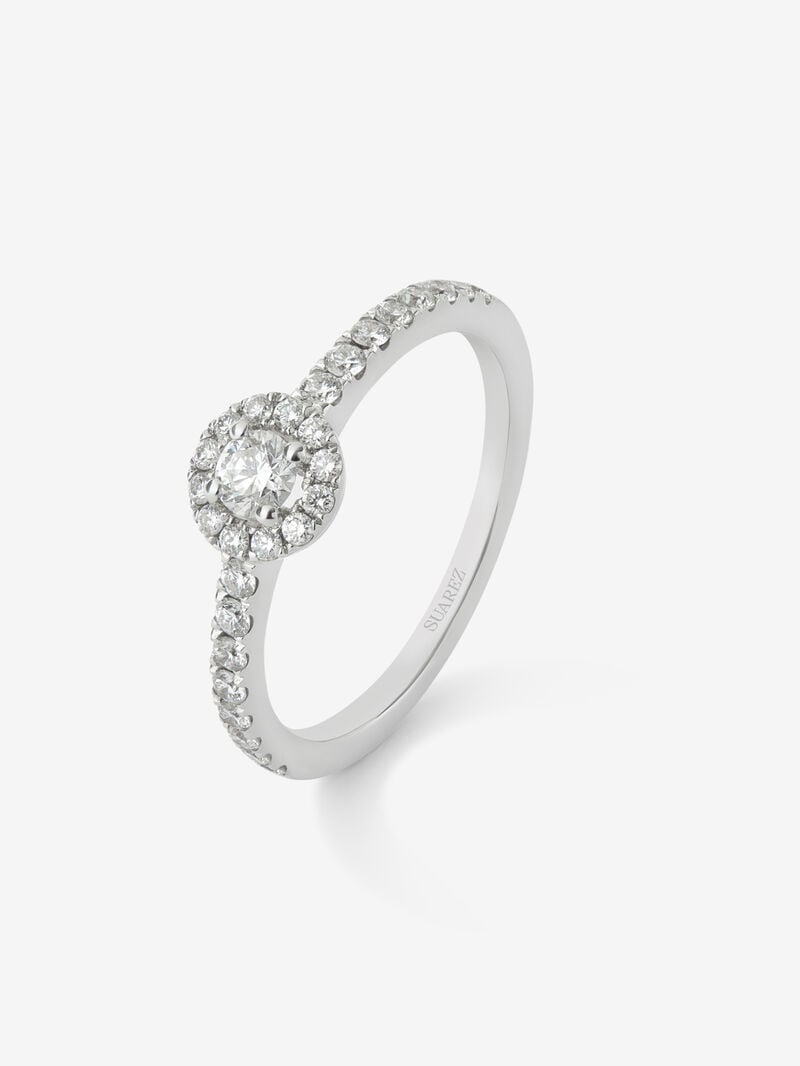 18K white gold ring with central brilliant-cut diamond of 0.15 cts and border and arm of 28 brilliant-cut diamonds with a total of 0.3 cts image number 0