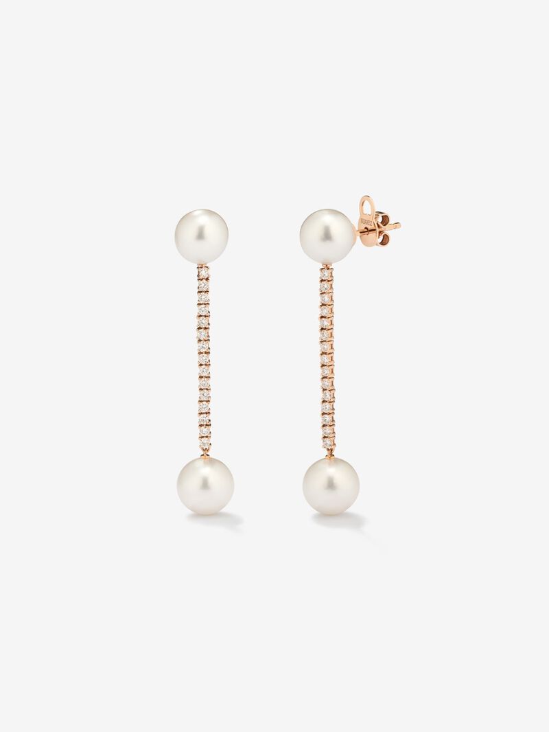 Long hanging earrings of 18K rose gold with diamond and pearl. image number 0