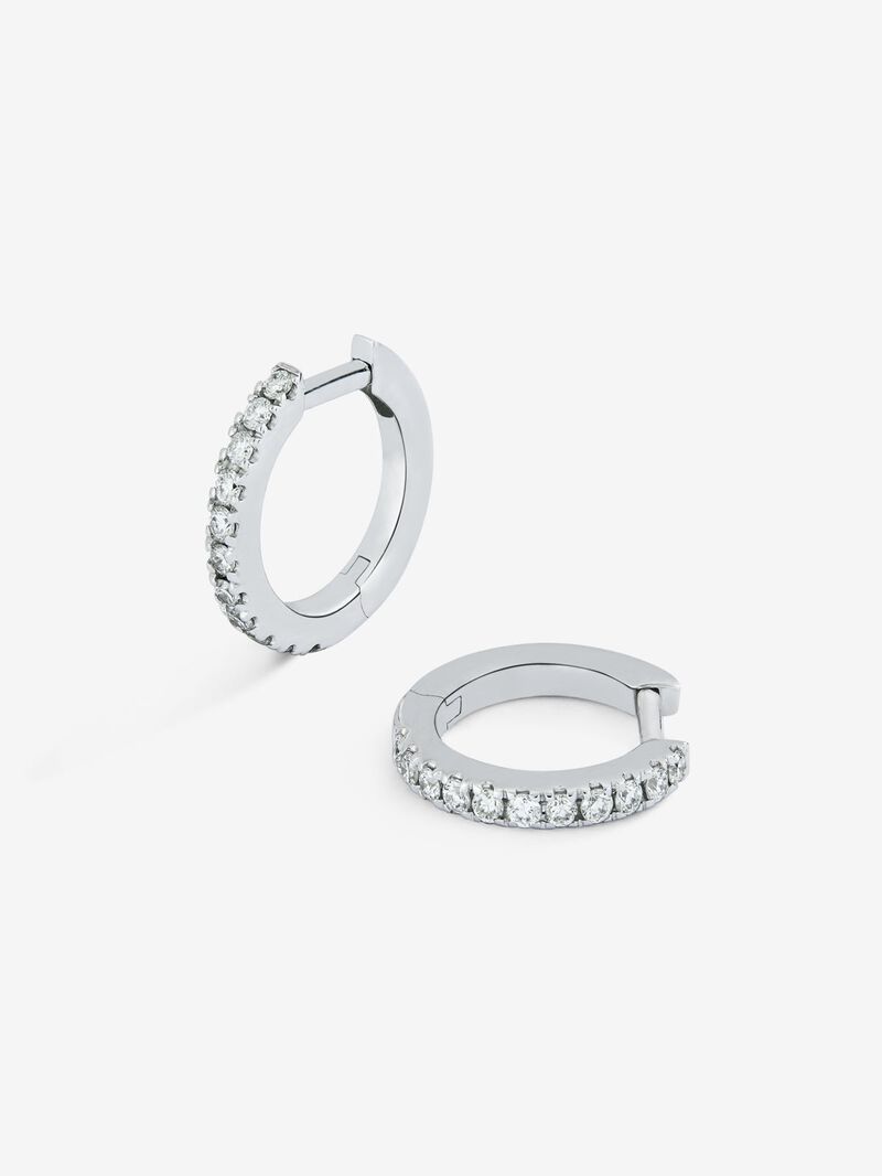 Small 18K white gold hoop earrings with diamonds. image number 4