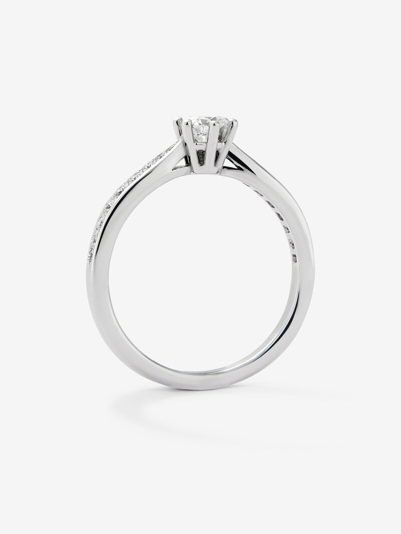Solitaire ring in 18K white gold with a central 0.30-carat brilliant-cut diamond and additional diamonds totaling 0.15 cts image number 4