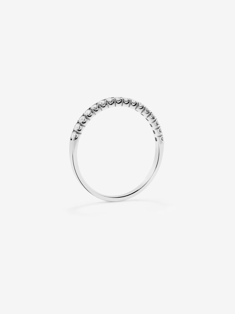 Half eternity engagement ring in 18K white gold with claw set diamonds. image number 4