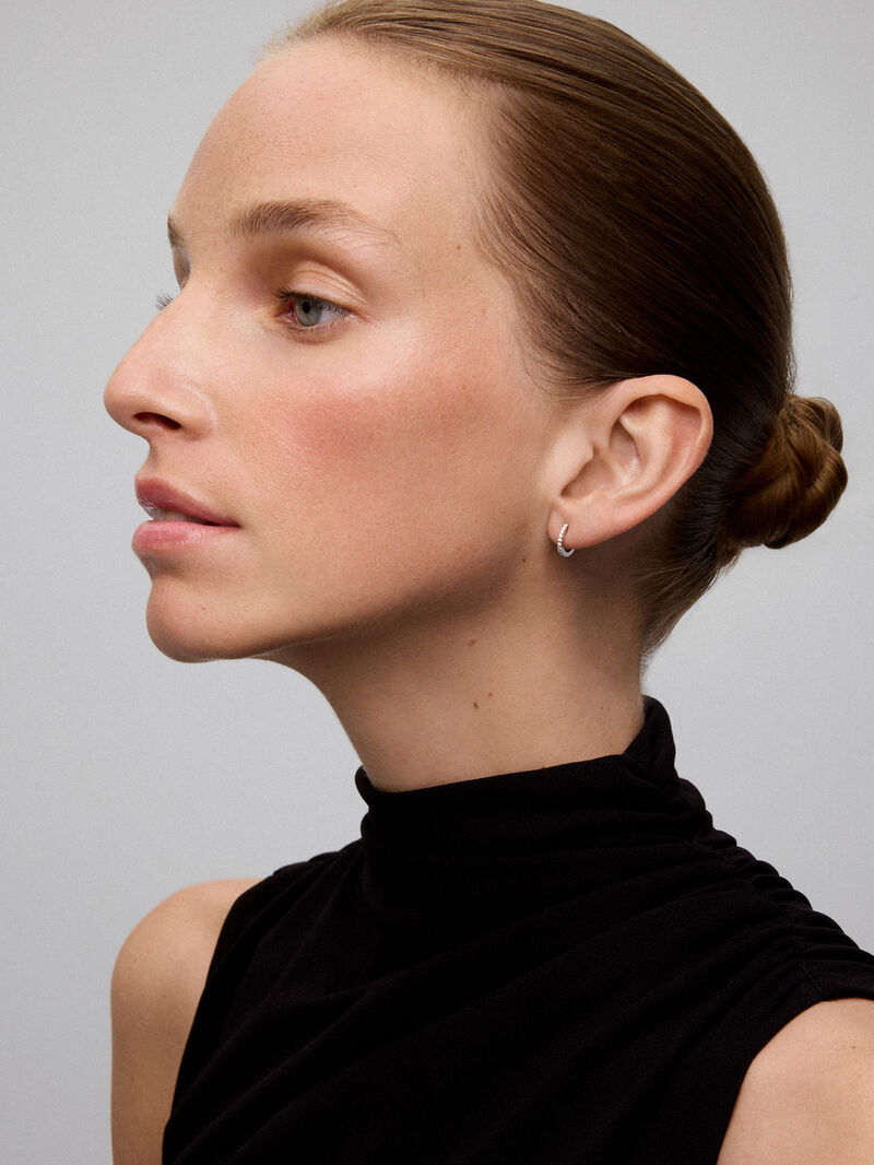 Small 18K white gold hoop earrings with diamonds. image number 7