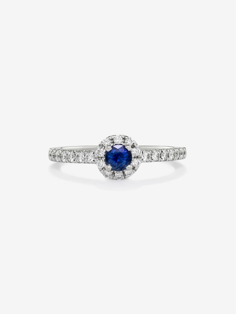 18K white gold ring with brilliant-cut blue sapphire of 0.4 cts and border and arm of 24 brilliant-cut diamonds with a total of 0.3 cts image number 1