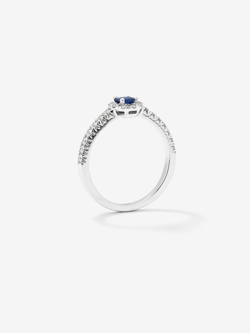 18K white gold ring with brilliant-cut blue sapphire of 0.4 cts and border and arm of 24 brilliant-cut diamonds with a total of 0.3 cts image number 2