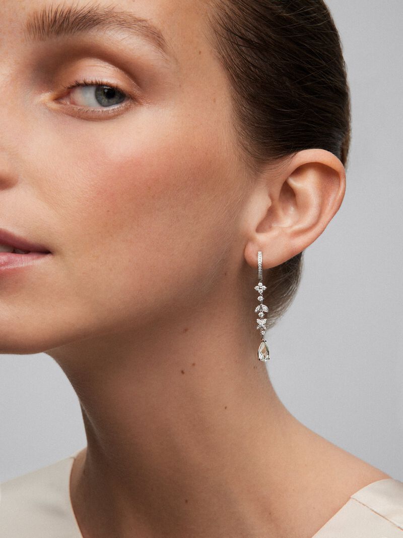 18K white gold earrings with 64 brilliant-cut diamonds with a total of 0.64 cts and 2 pear-cut green amethysts image number 3