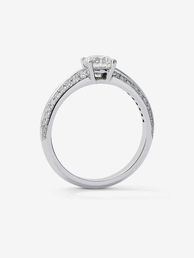 Solitaire ring in 18K white gold with a 0.70-carat central diamond and additional brilliant-cut diamonds totaling 0.25 cts image number 4