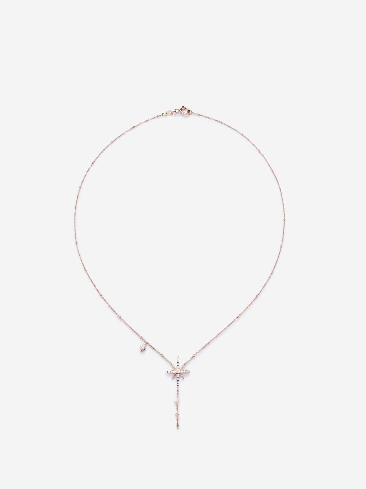 Colgante cadena largo con estrella de oro rosa de 18K con diamantes