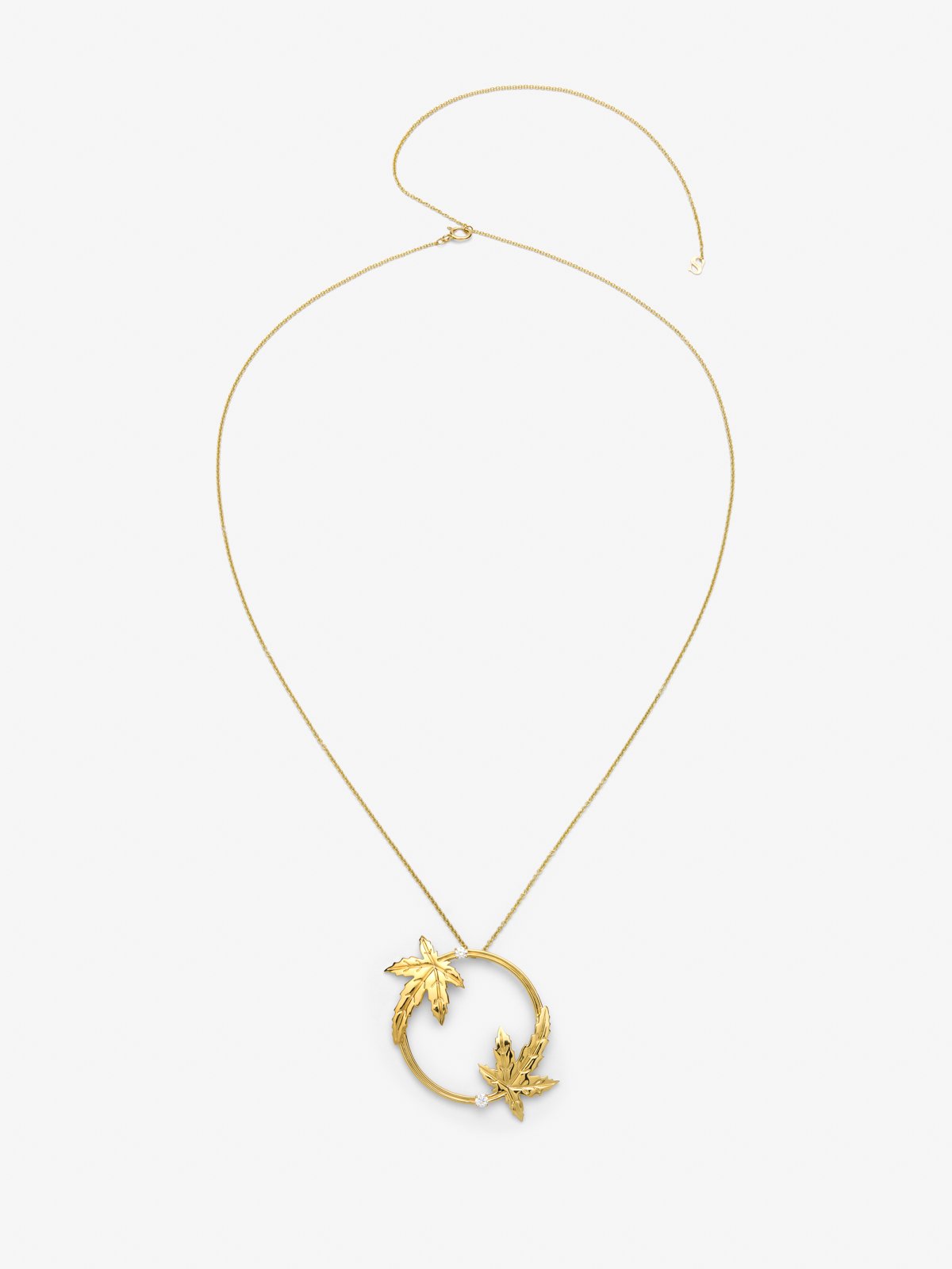 Colgante de oro amarillo de 18K con dos diamantes en talla brillante con un total de 0,33 cts y forma de hojas de arce