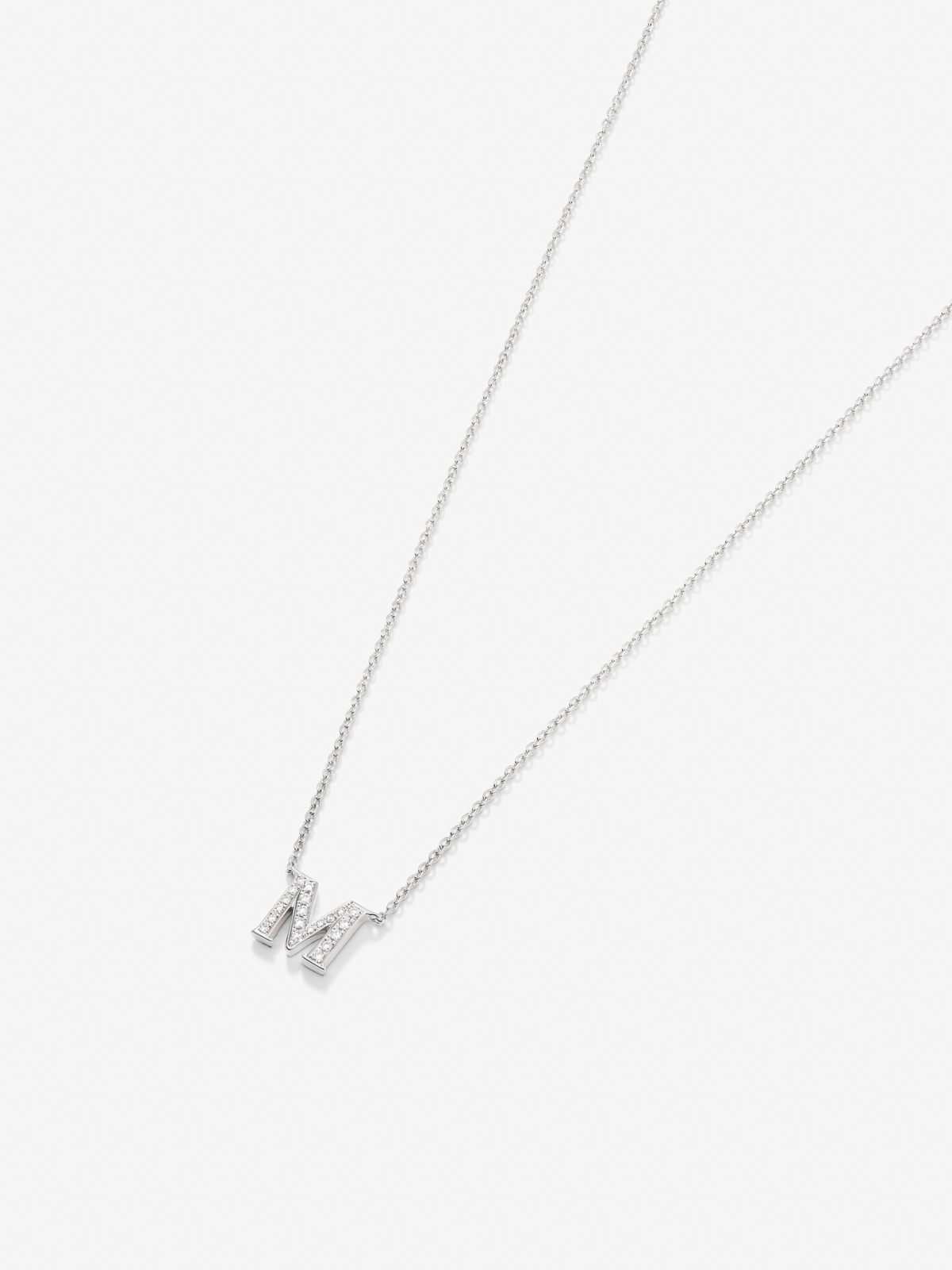 Pendant chain with small initial in 18K white gold and diamonds.
