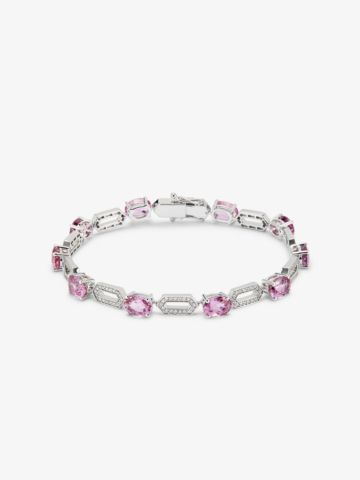 Pulsera de oro blanco de 18K con zafiros rosas en talla oval de 11,22 cts y diamantes blancos en talla brillante de 0,66 cts