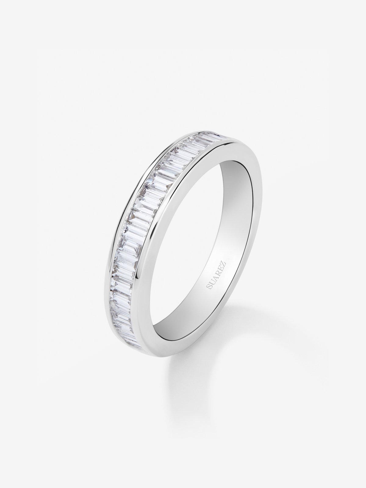 Half band ring in 18K white gold with half-circle of baguette-cut diamonds totaling 0.63 cts