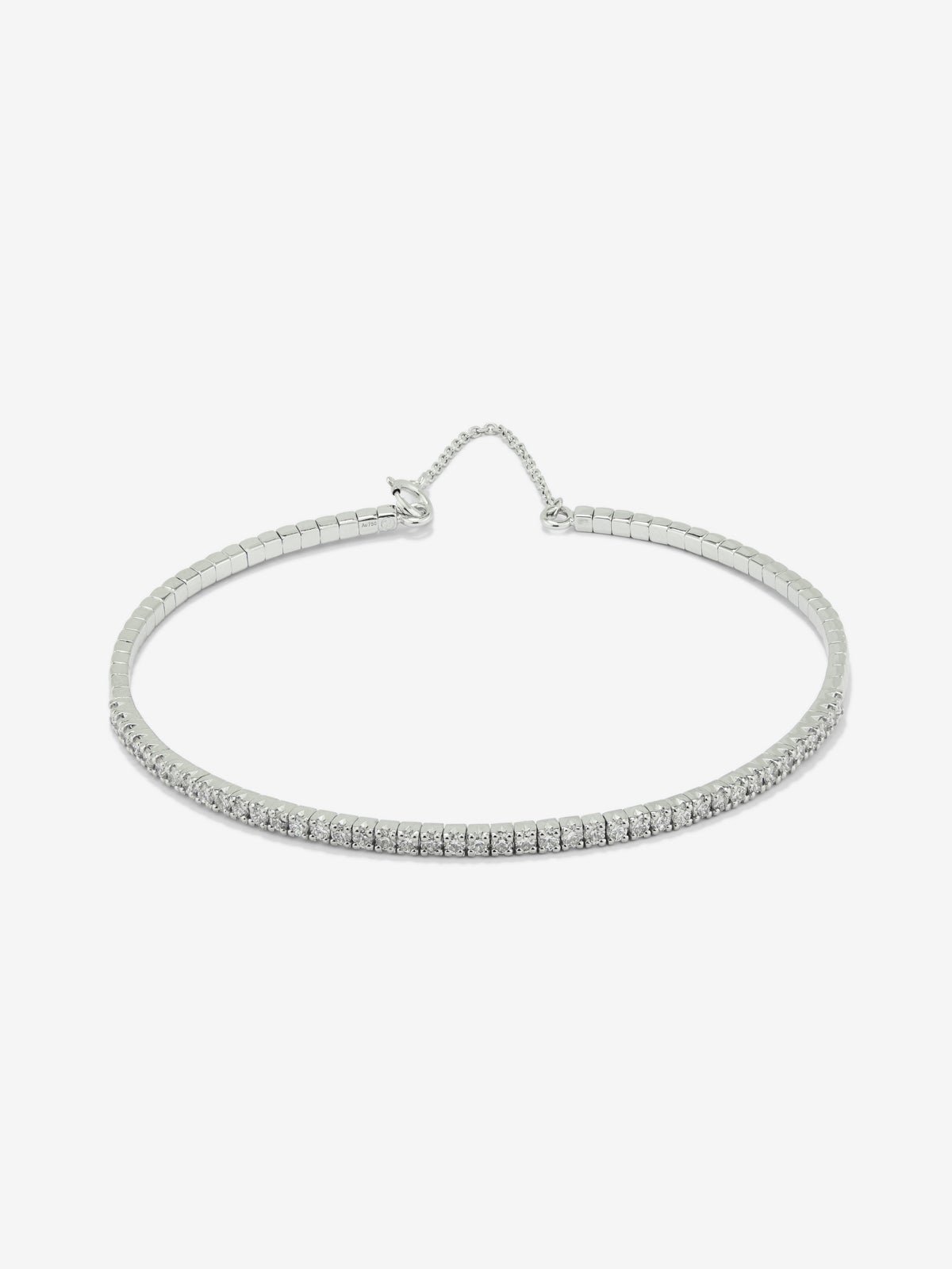 Pulsera rígida de oro blanco de 18K con 42 diamantes en talla brillante con un total de 0,71 cts